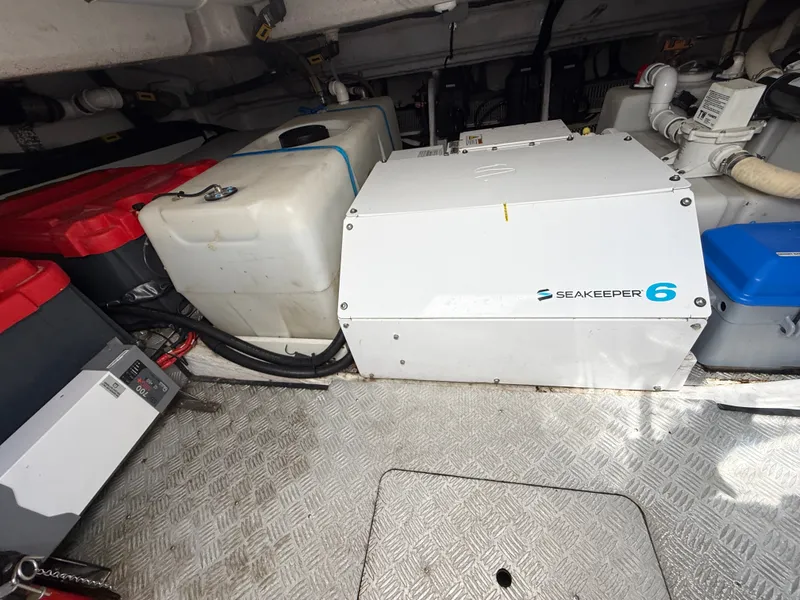 Slide: The Image of The engine room of a 2019 Azimut Verve 40 features a Seakeeper 6 stabilizer. - 36