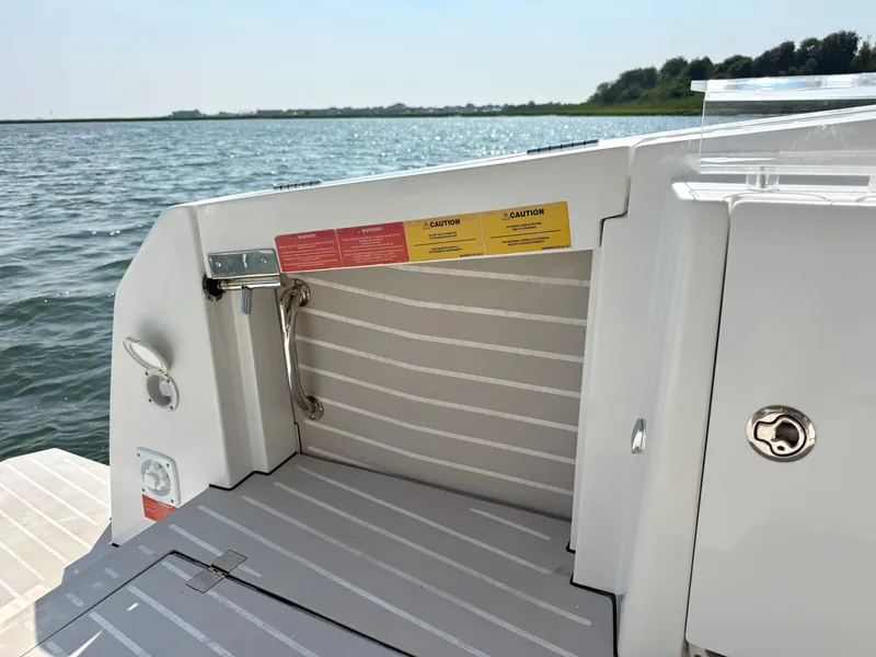 Slide: The Image of The image shows the stern of a 2019 Azimut Verve 40 with a swim platform. - 23