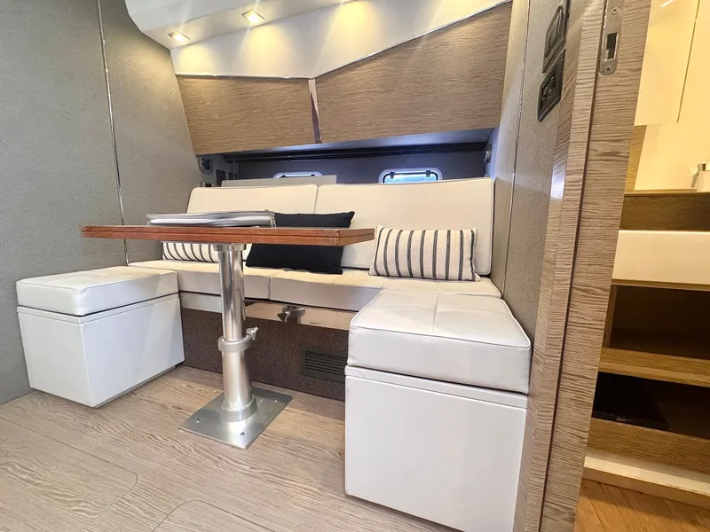 Slide: The Image of Interior of the 2019 Azimut Verve 40 with elegant seating area and wooden table. - 31