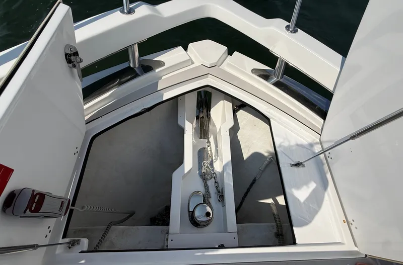Slide: The Image of The bow area of a 2019 Azimut Verve 40 with anchor and chain locker. - 21