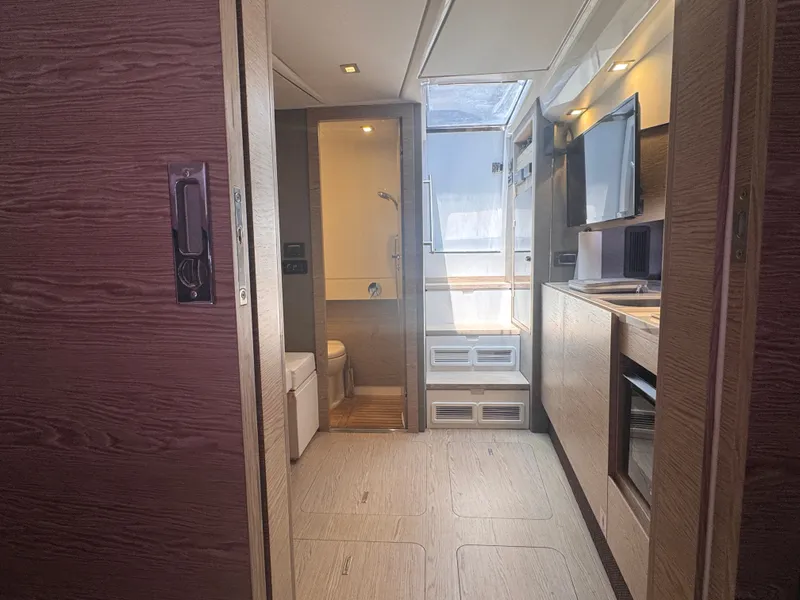 Slide: The Image of Interior of a 2019 Azimut Verve 40 with modern design and wood finish. - 28