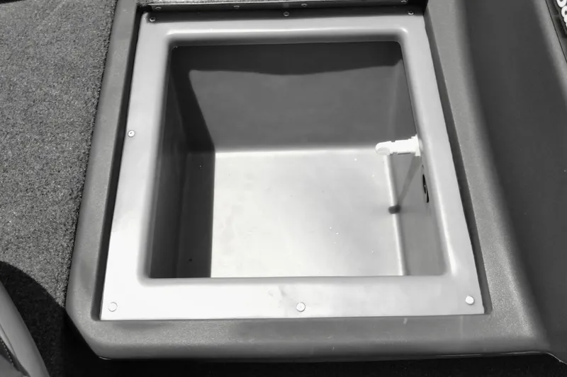 Slide: The Image of Bass Tracker 2026 boat storage compartment with drain, featuring durable construction and spacious interior. - 10