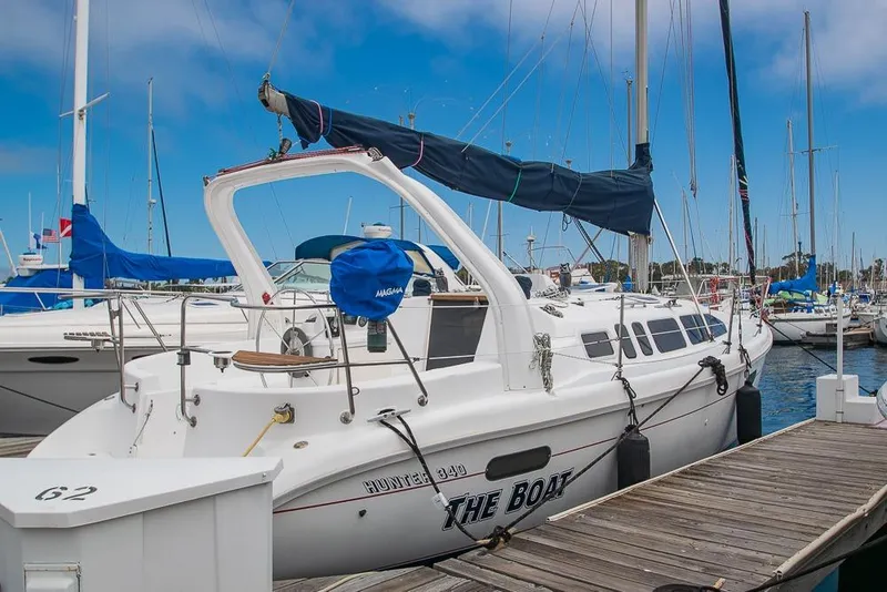 The Image of Sailboat Hunter 340, 1999 model, docked at marina with clear blue sky. - 0