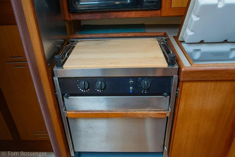 Slide: The Image of Stainless steel stove in a 1999 Hunter 340 yacht kitchen. - 11