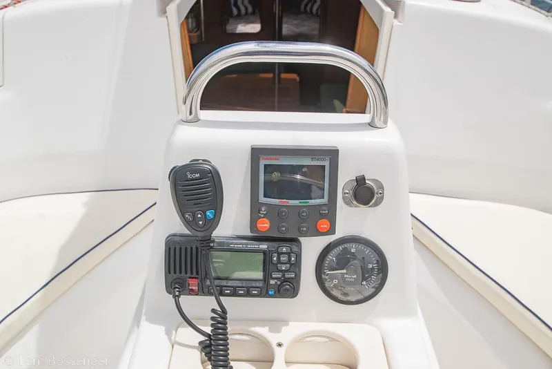Slide: The Image of Control panel of a 1999 Hunter 340 sailboat with navigation and communication equipment. - 26