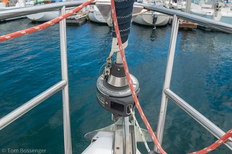 Slide: The Image of Bow of a 1999 Hunter 340 sailboat with furler and ropes in a marina. - 34