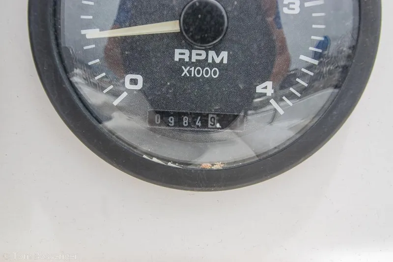 Slide: The Image of Close-up of a Hunter 340 tachometer showing 984.9 RPM. - 37
