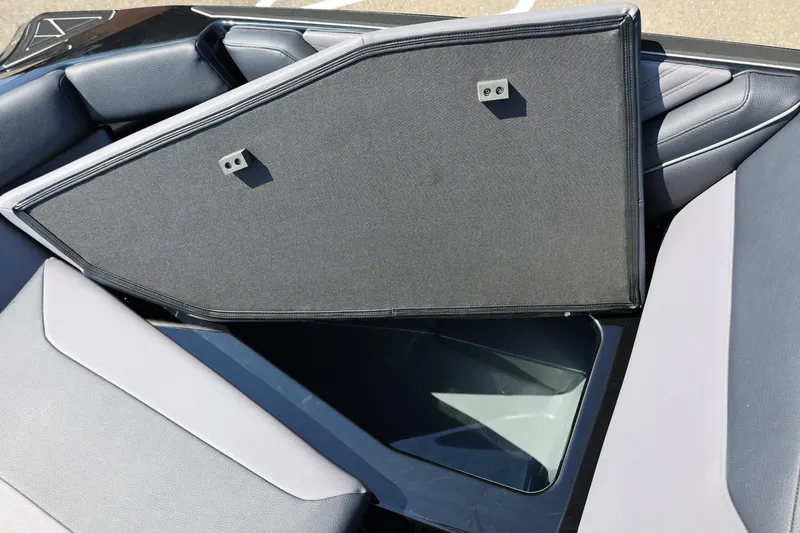 Slide: The Image of An open storage compartment lid on a 2027 ATX Surf Boat 22 Type-S. - 45