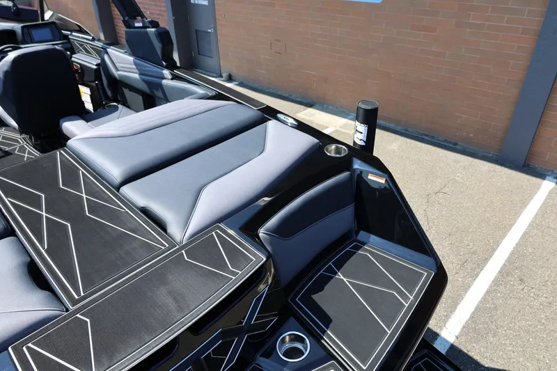 Slide: The Image of The image shows the stylish interior of a 2027 ATX Surf Boats 22 Type-S. - 17