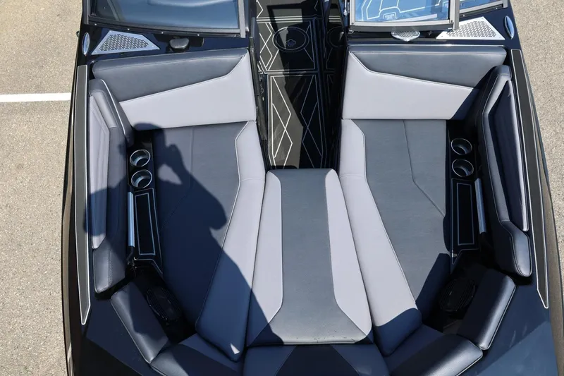 Slide: The Image of The image shows the cockpit of a 2027 ATX Surf Boats 22 Type-S with gray upholstery. - 47