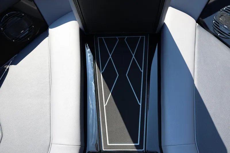 Slide: The Image of The image shows the interior of a 2027 ATX Surf Boats 22 Type-S with stylish flooring. - 44