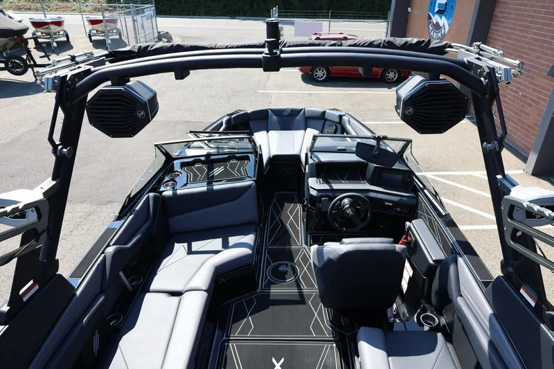 Slide: The Image of The image shows the interior of a 2027 ATX Surf Boats 22 Type-S with modern seating and speakers. - 23