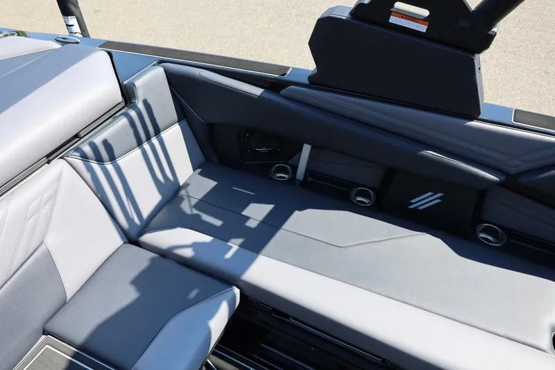 Slide: The Image of The image shows the interior of a 2027 ATX Surf Boats 22 Type-S with gray upholstery. - 27
