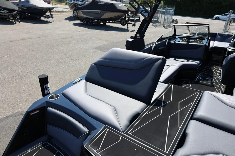 Slide: The Image of The image shows the interior of a 2027 ATX Surf Boats 22 Type-S with modern seating. - 19