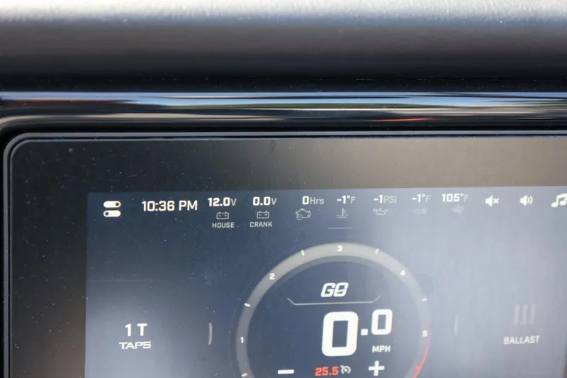 Slide: The Image of Close-up of a boat dashboard with digital displays and controls. - 35