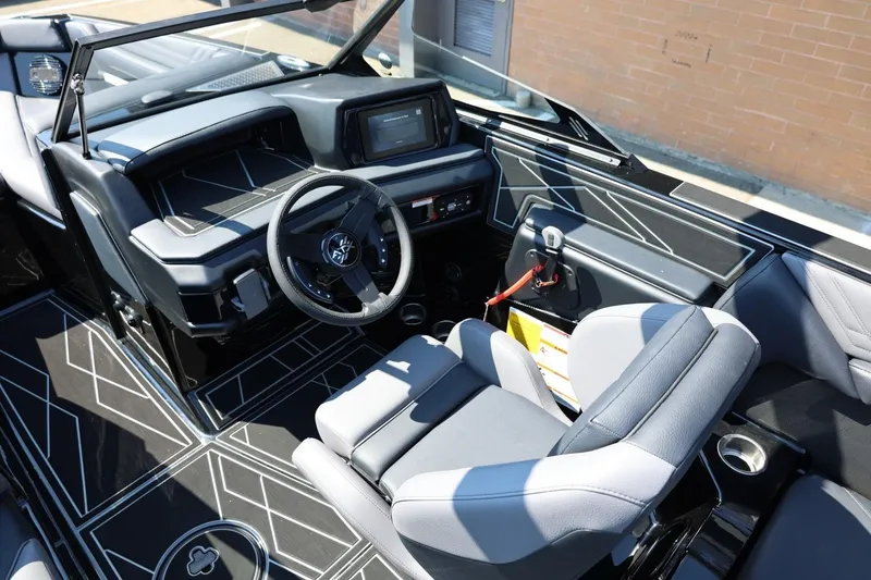 Slide: The Image of The image shows the cockpit of a 2027 ATX Surf Boats 22 Type-S with a modern design. - 33
