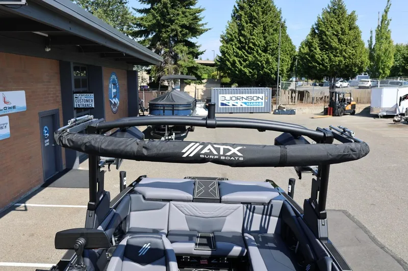 Slide: The Image of A 2027 ATX Surf Boat 22 Type-S is parked. It features gray upholstery and a modern design. - 49