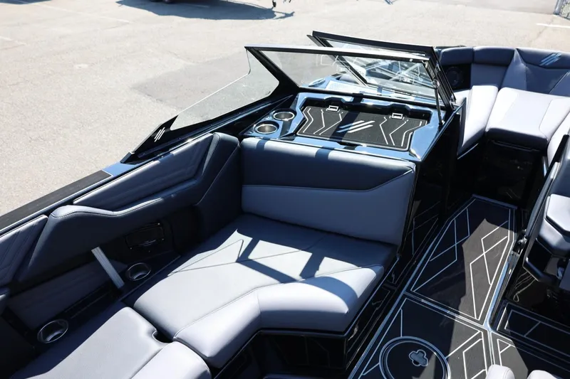 Slide: The Image of The image shows the interior of a 2027 ATX Surf Boats 22 Type-S with modern seating and stylish design. - 25