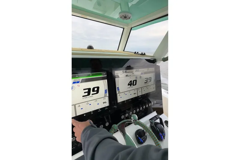Slide: The Image of Dashboard of 2025 Insetta 35IFC boat showing speed and controls. - 17