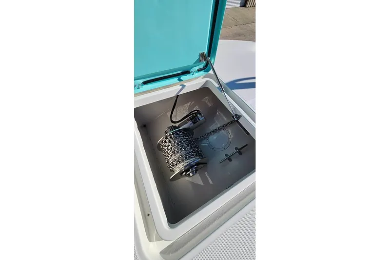 Slide: The Image of Open hatch of 2025 Insetta 35IFC boat showing anchor chain storage. - 16