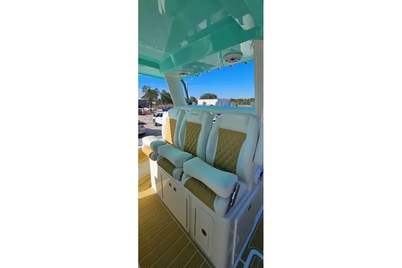 Slide: The Image of Luxury seating on 2025 Insetta 35IFC boat, featuring plush cushions and elegant design. - 10