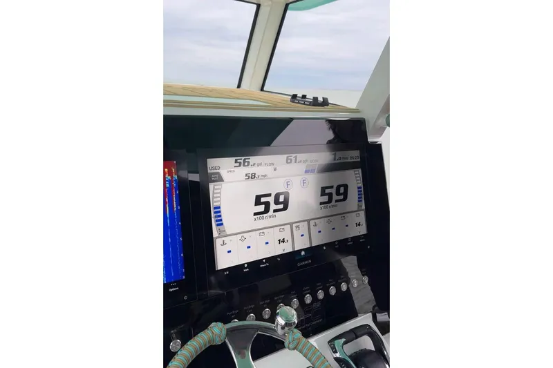 Slide: The Image of Cockpit display of 2025 Insetta 35IFC showing speed and engine data. - 18