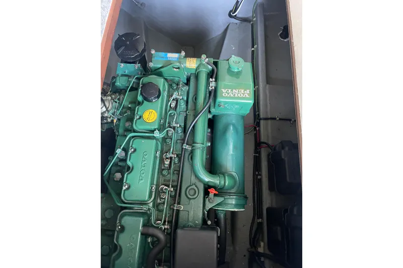 Slide: The Image of Engine compartment of a 1992 Camano Troll Sedan 31 with Volvo Penta engine. - 22