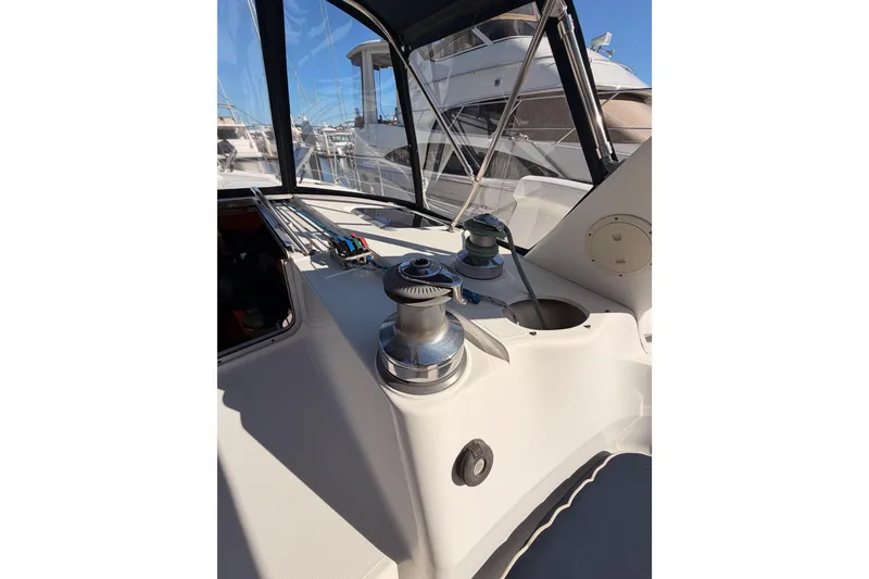 Slide: The Image of Cockpit view of a 1997 Hunter 430 sailboat with winches and ropes. - 31