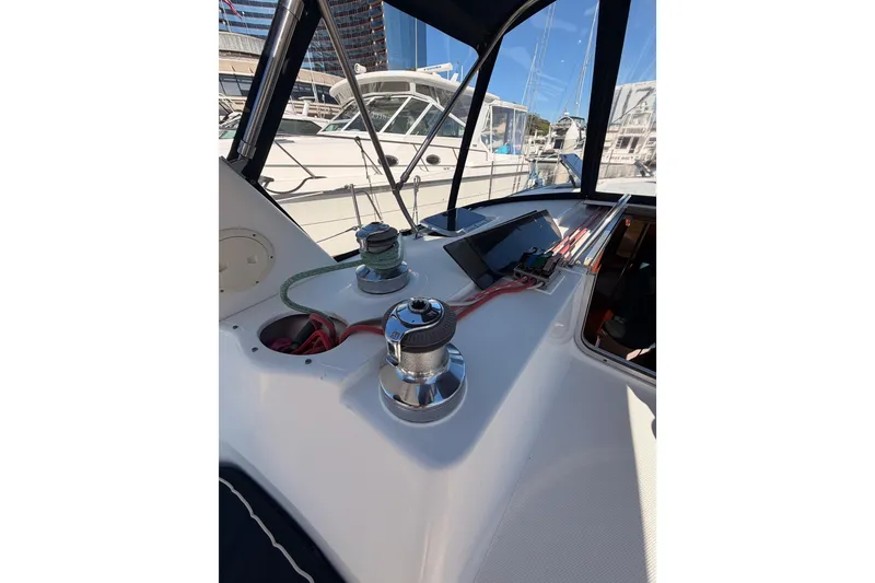 Slide: The Image of Cockpit view of a 1997 Hunter 430 sailboat with winches and ropes. - 30
