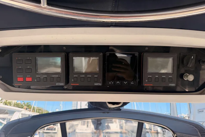 Slide: The Image of Control panel of a 1997 Hunter 430 sailboat with navigation instruments. - 14