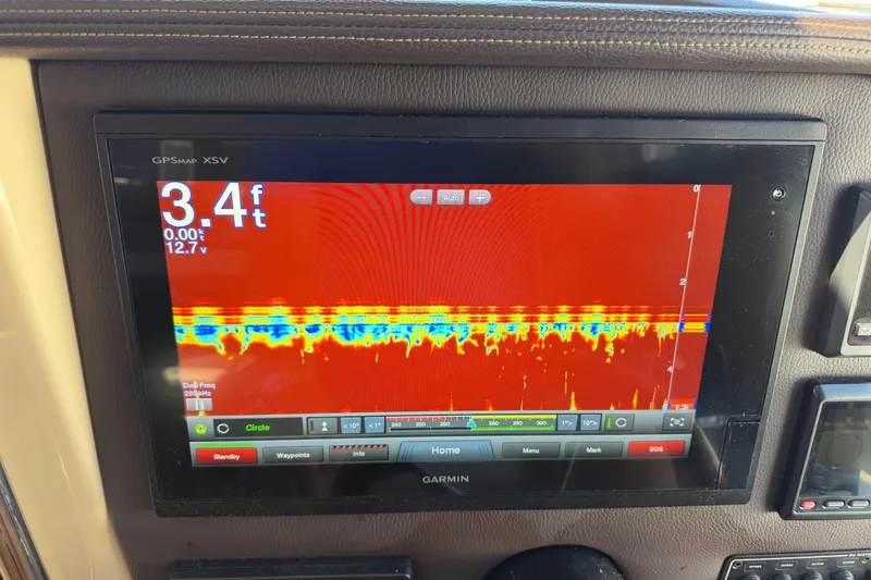 Slide: The Image of Garmin GPSMAP XSV sonar display on 2017 Ranger Tugs R-31 S, showing depth of 3.4 feet. - 31