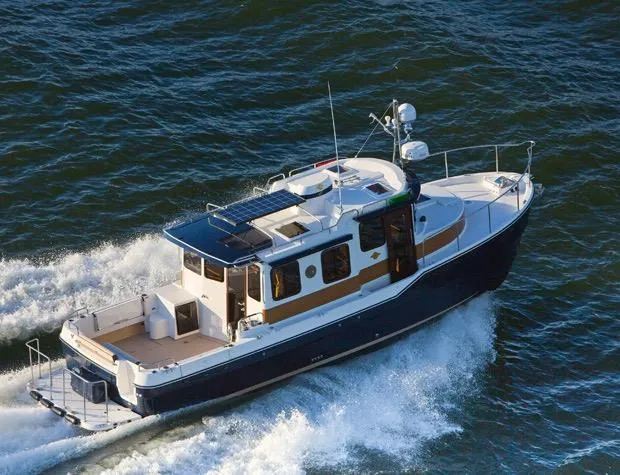 Slide: The Image of Manufacturer Provided Image: 2017 Ranger Tugs R-31 S cruising on the water. - 78