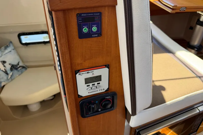 Slide: The Image of 2017 Ranger Tugs R-31 S interior showing control panel and seating area. - 57