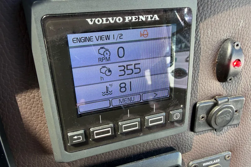 Slide: The Image of Volvo Penta engine display on 2017 Ranger Tugs R-31 S, showing RPM and temperature. - 32