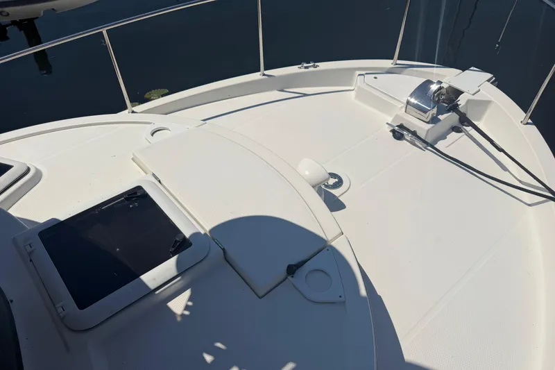 Slide: The Image of 2017 Ranger Tugs R-31 S boat deck with hatch and anchor system. - 66