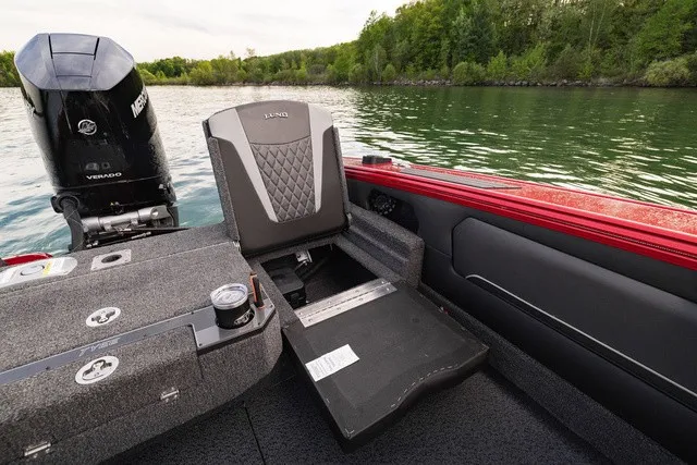 Slide: The Image of Lund 2275 Tyee Sport 2027: Spacious cockpit with comfortable seating and a powerful outboard motor. - 5
