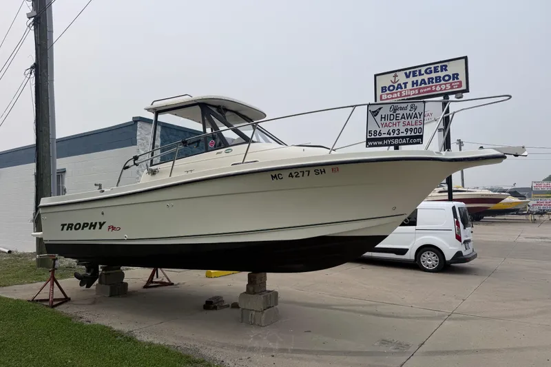 Slide: The Image of 2002 Bayliner 2052 Trophy Walkaround DX/LX boat displayed at Velger Boat Harbor. - 2