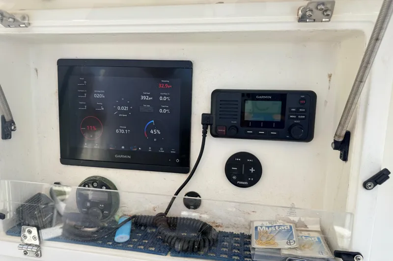Slide: The Image of Garmin marine electronics on a 2006 Contender 31 Open boat dashboard. - 19