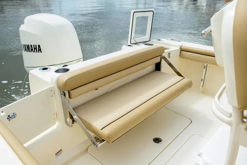 Slide: The Image of Manufacturer Provided Image: 2019 Scout 215 XSF boat with Yamaha engine and foldable seating. - 17
