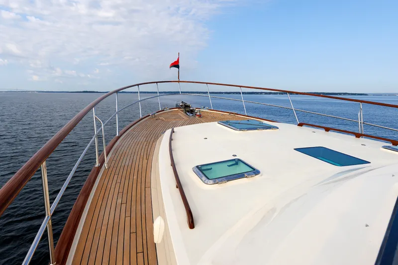 Slide: The Image of Luxurious 2016 Hunt Yachts 72 FB deck with ocean view and clear sky. - 62