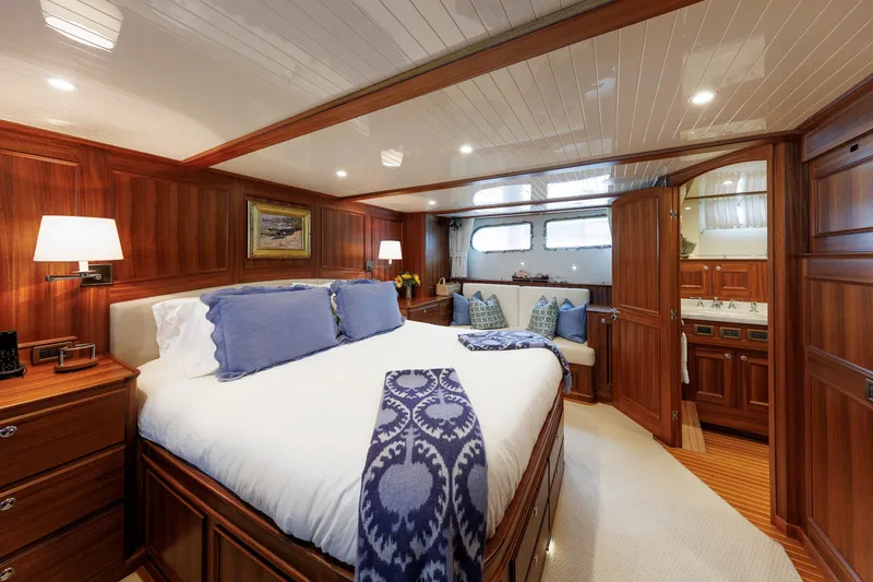 Slide: The Image of Luxurious cabin interior of 2016 Hunt Yachts 72 FB with elegant wood paneling. - 31