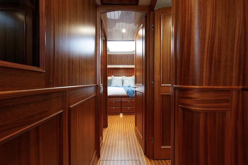 Slide: The Image of Luxurious wooden interior of 2016 Hunt Yachts 72 FB, featuring a cozy bedroom. - 35