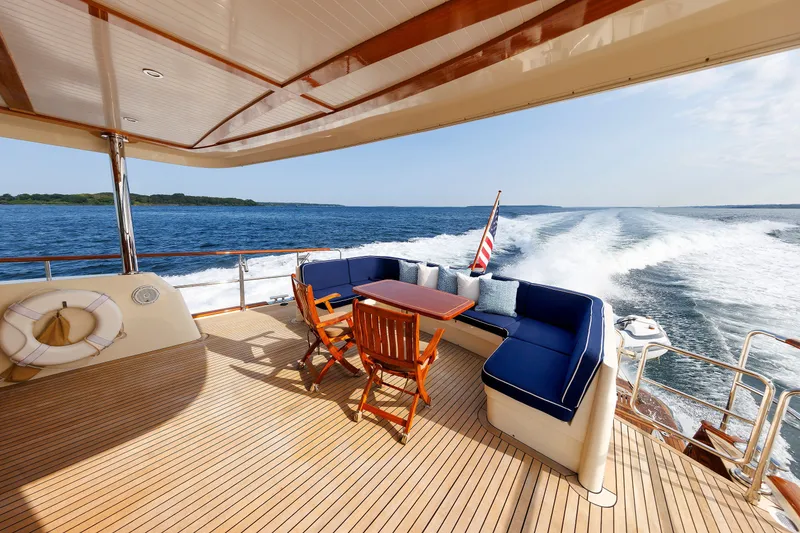 Slide: The Image of Luxurious 2016 Hunt Yachts 72 FB cruising with elegant deck seating and ocean view. - 9