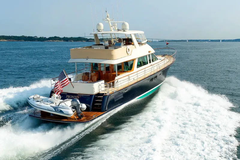 Slide: The Image of 2016 Hunt Yachts 72 FB cruising on open water, showcasing luxury and performance. - 86