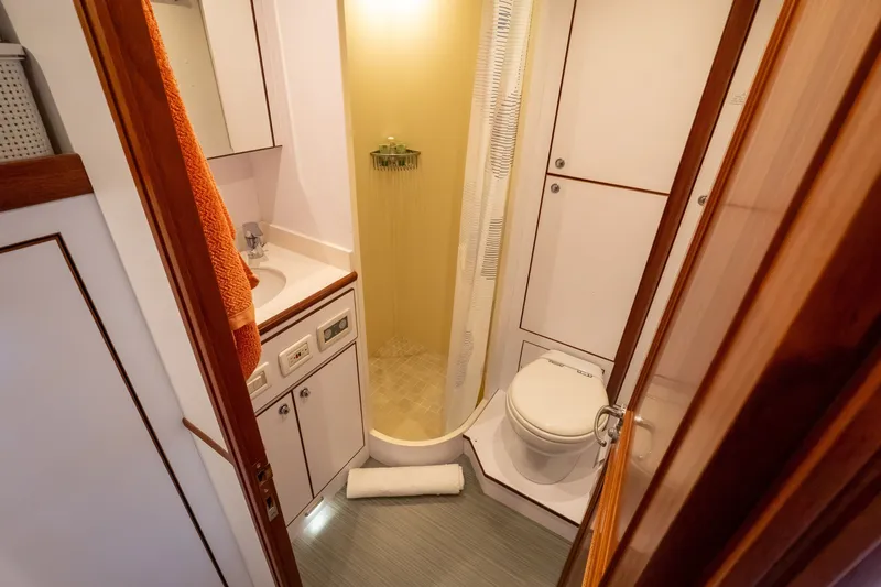 Slide: The Image of Luxurious bathroom in 2016 Hunt Yachts Ocean Series 72FB, featuring shower and modern amenities. - 66