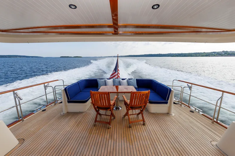 Slide: The Image of Luxurious 2016 Hunt Yachts 72 FB cruising with elegant deck seating and ocean view. - 10