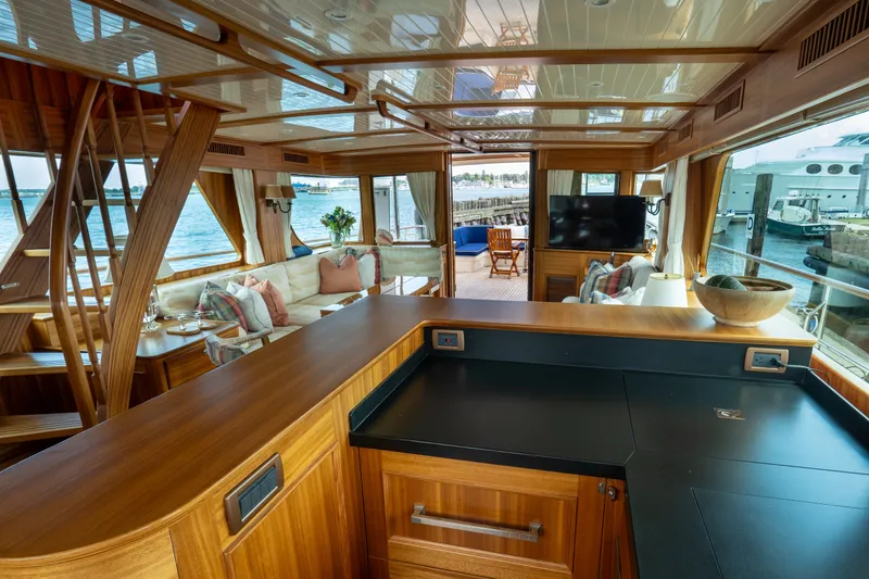 Slide: The Image of Luxurious interior of 2016 Hunt Yachts Ocean Series 72FB with elegant wood finishes and waterfront view. - 15