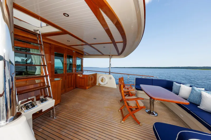 Slide: The Image of Luxurious 2016 Hunt Yachts 72 FB deck with elegant seating and ocean view. - 8