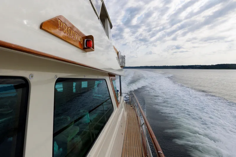 Slide: The Image of Side view of 2016 Hunt Yachts 72 FB cruising on open water. - 57