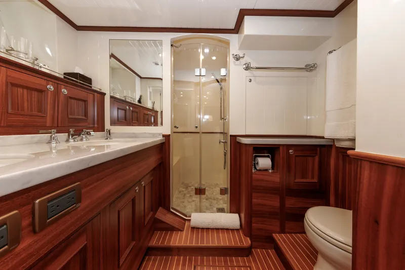 Slide: The Image of Luxurious bathroom in 2016 Hunt Yachts 72 FB, featuring wood accents and modern fixtures. - 33